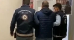 Sahte pasaportla göçmen kaçakçılığı